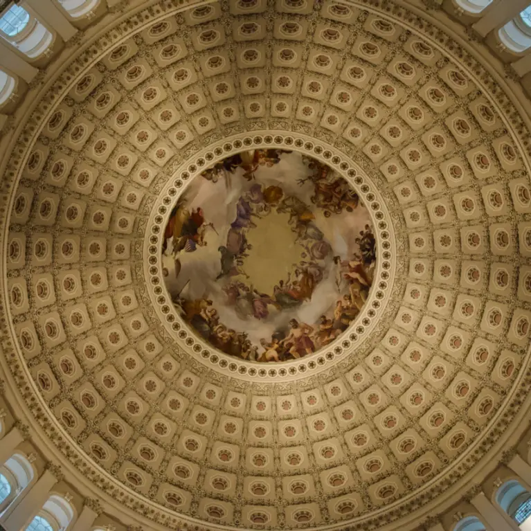 Interior view of the ornate U.S. Capitol dome, representing the legal rigor and authority behind investment structuring.